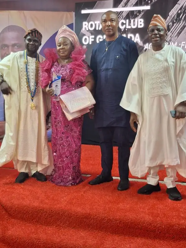 Mrs Erezi Joice Eterigho receiving the Rotary Club award