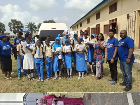 Students and volunteers outside the school