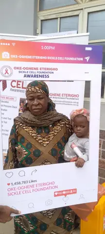 A grandmother and child at the outreach