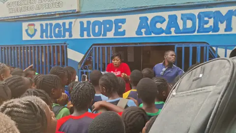 Students gathered at the school gate