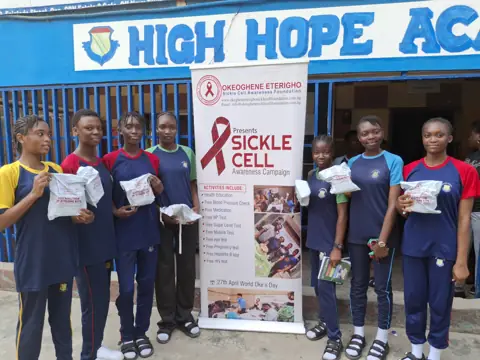 Students holding their hygiene kits