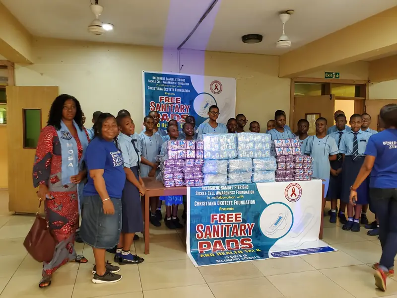 Students and our team with the free sanitary pads